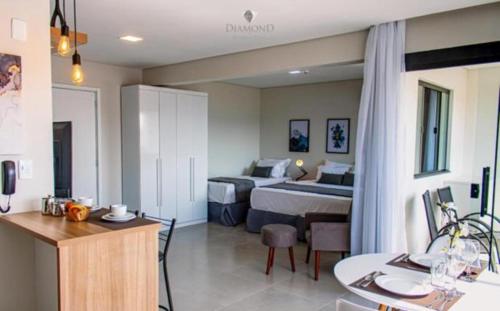 Gambar di galeri bagi Flats novos e modernos, próximos ao centro, em um ambiente de excelência no Diamond di São Lourenço