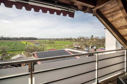 a view from the balcony of a house with solar panels at Haus48 in Neuried