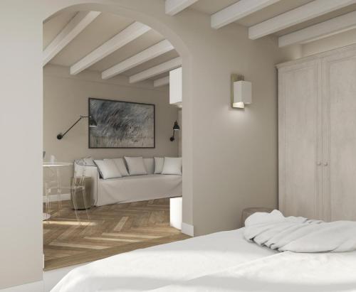 Un pat sau paturi într-o cameră la La Corte Luxury Apartment - BRERA