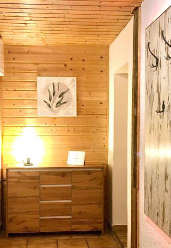 a room with a sauna with a light on it at Sonnenhof Bad Schandau in Bad Schandau