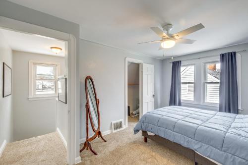 a bedroom with a bed and a ceiling fan at Convenient Cleveland Abode with Office and Home Gym in Cleveland
