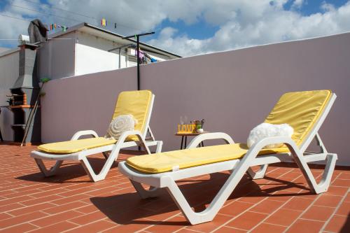 Foto Casa Amarela - Conforto e localização central! 6