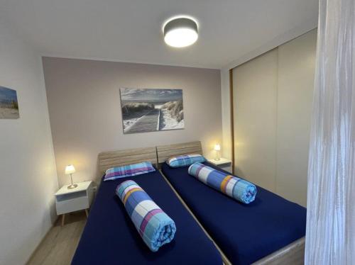 Postel nebo postele na pokoji v ubytování Apartment Gerberbachviertel