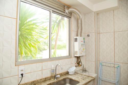 Et badeværelse på Apartamento Aconchego beach