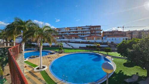 a view of a swimming pool in a resort at Coastal Dream Villa in San Miguel de Abona