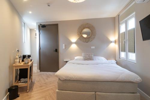 Letto o letti in una camera di SAYŌ Boutique Hotel