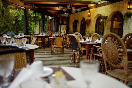 En restaurant eller et andet spisested på Campos Hotel do Sol