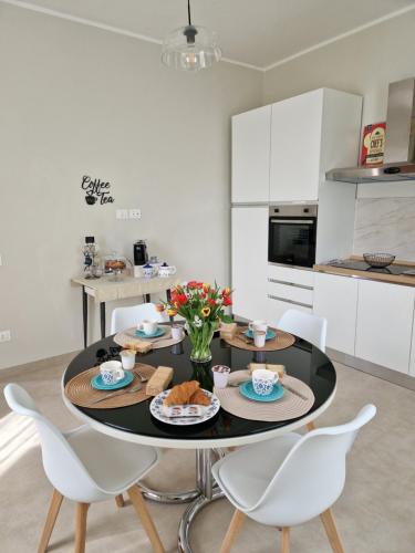 a kitchen with a table with food on it at B&B Noemi in Foligno