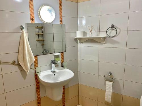a bathroom with a sink and a mirror at “Sunny Beach Hills” Apartment B2.8 in Sunny Beach