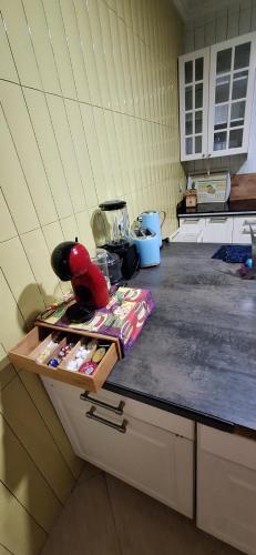 a counter in a kitchen with a counter top at Super Cozy Apartment in Larache