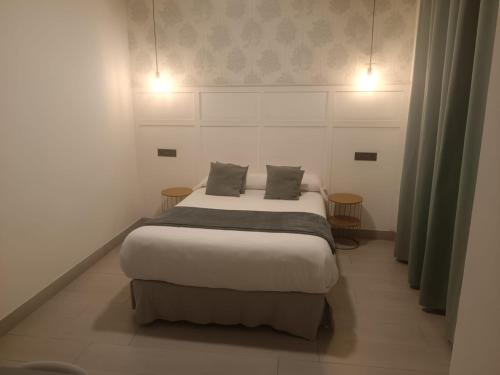 Cama o camas de una habitación en Hotel Cedran