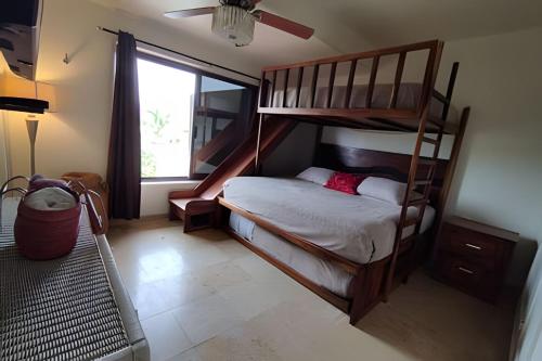 Postel nebo postele na pokoji v ubytování Ixtapa frente al mar