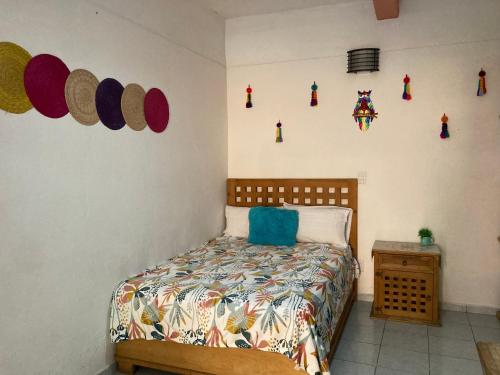 Katil atau katil-katil dalam bilik di Cómoda y amplia Habitación en Jalatlaco