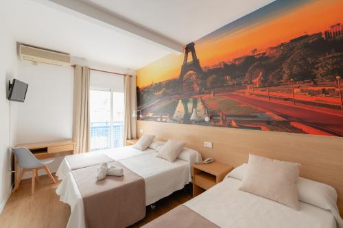 Postel nebo postele na pokoji v ubytování Hotel Internacional