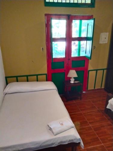 Cama o camas de una habitación en FINCA HOTEL LA DORADA en el Vereda Castillo
