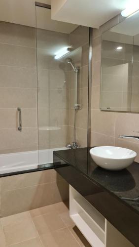 a bathroom with a sink and a mirror at Beachfront SeaView Home in Lusail