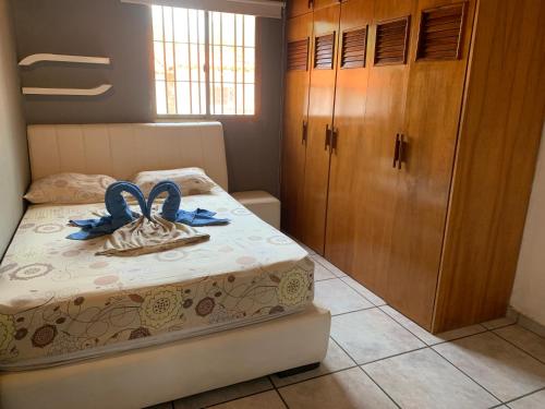 Postel nebo postele na pokoji v ubytování Appartement avec commodite 150Mts de la plage