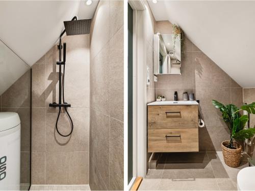 een badkamer met een douche en een wastafel bij Fit For Two Families! 8 Bedrooms! 2 Bathrooms! in Bergen