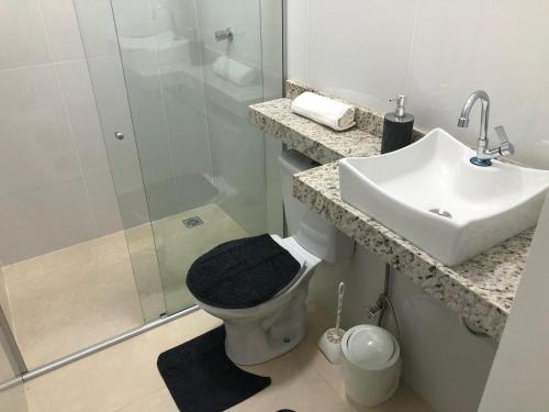 Ένα μπάνιο στο Lençóis Prime Apartments