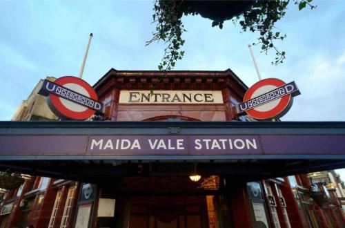 a sign for the entrance to a madlia valley station at The Private Rooms in Paddington in London