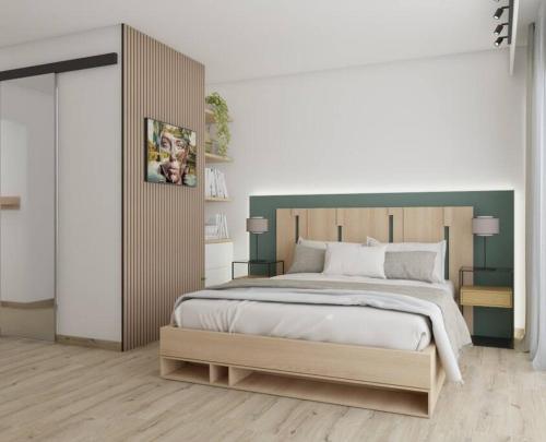 une chambre avec un grand lit et deux tables de nuit dans l'établissement ZEN & COSY - CARRÉ d'OR - Hyper centre - Plage, à Nice