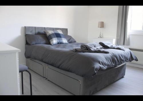 Llit o llits en una habitació de Canterbury Escapes 2 bedrooms