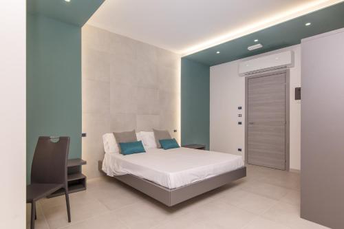 Ένα ή περισσότερα κρεβάτια σε δωμάτιο στο Le note di Fred Rent Room