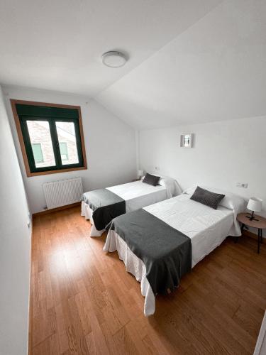 Posteľ alebo postele v izbe v ubytovaní PortoHome II