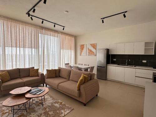 Η κουζίνα ή μικρή κουζίνα στο Green Coast Palase Sun Kissed Terrace Villa 110A