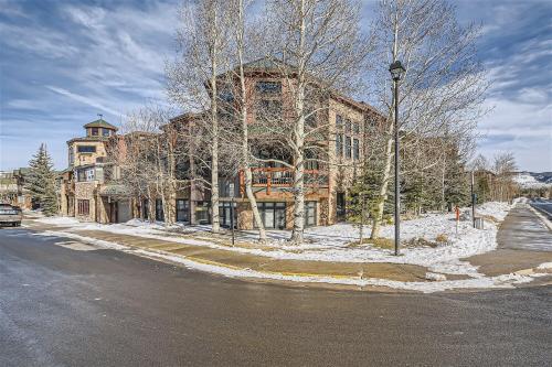 a building on the side of a street in the snow at Condos Off Main 15 condo in Frisco