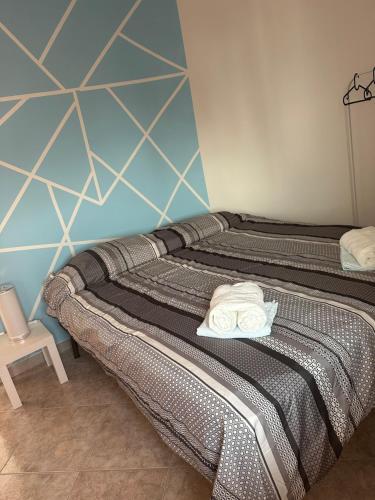 Cama ou camas em um quarto em Appartamento al Mare