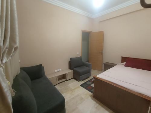 Χώρος καθιστικού στο Bel Appart meublé