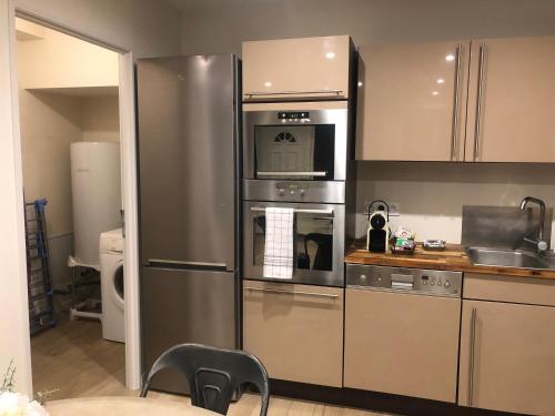 Η κουζίνα ή μικρή κουζίνα στο Appartement T2 spacieux et équipé