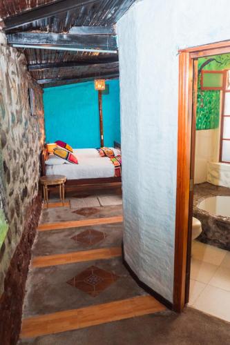 Spa Hosteria Miramelindoにあるベッド