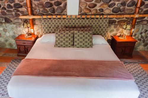 Spa Hosteria Miramelindoにあるベッド