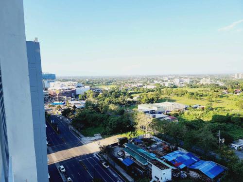 vista de uma cidade a partir de um edifício em SW 15L, The Palladium, Megaworld Blvd. Iloilo City em Iloilo