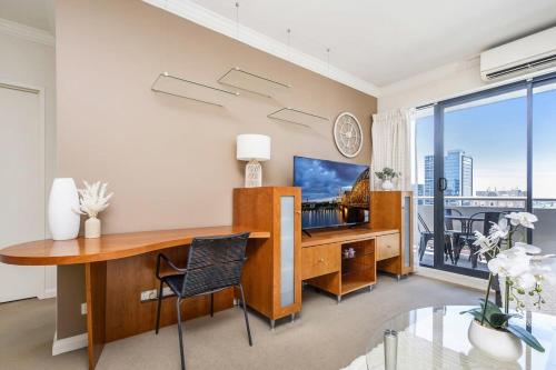 a home office with a desk and a window at Convenient 2-Bed Apartment in the Heart of Perth in Perth
