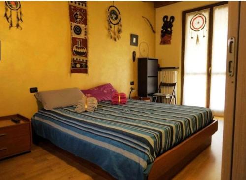 Tempat tidur dalam kamar di La casa dell'ulivo