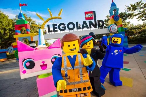 a group of lego people standing in front of legoland at Golf - Beach - Legoland - Shopping - Dining in Carlsbad