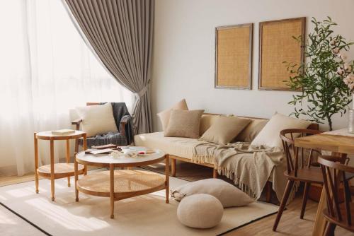 a living room with a couch and a table at Lazy Cozy Summer Afternoon Healing Daily Life in Klang