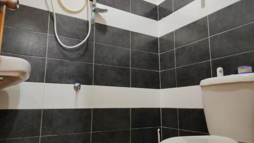 Koupelna v ubytování Raudhah Rest Inn