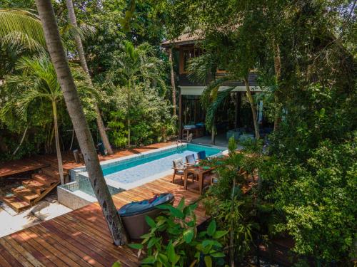 an aerial view of a resort with a swimming pool at Private Beach House @ Hin Kong Beach in Hinkong