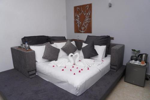 Postel nebo postele na pokoji v ubytování Fortview International Hotel