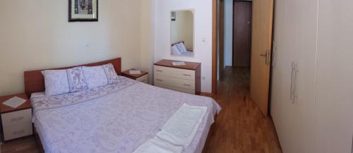 מיטה או מיטות בחדר ב-Gjole Apartments