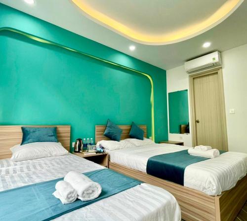 Кровать или кровати в номере Teddy 108 Homestay & Cafe - 3 stars - Grand World Phu Quoc