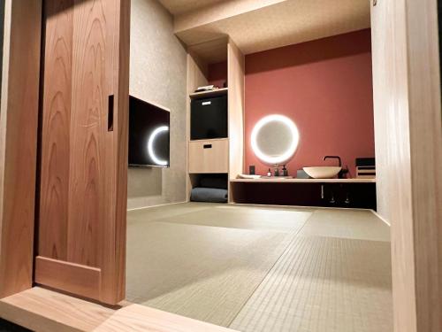 Koupelna v ubytování FUMAI sauna &INN-遠赤外線サウナ-松江の歴史と文化と共に過ごすsmart hotel