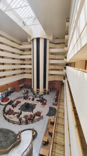 a view of a large room with tables and chairs at Xi'an Dajing Castle Hotel Bell Tower & YONGNING Gate in Xi'an