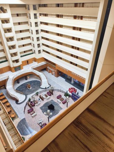 an overhead view of a pool in a mall with tall buildings at Xi'an Dajing Castle Hotel Bell Tower & YONGNING Gate in Xi'an