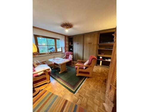 A seating area at Weissenbach in the Schenk holiday home