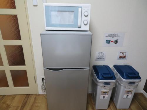 Kuchyň nebo kuchyňský kout v ubytování 札幌市中心部大通公園まで徒歩八分観光移動に便利なロケーションp3112